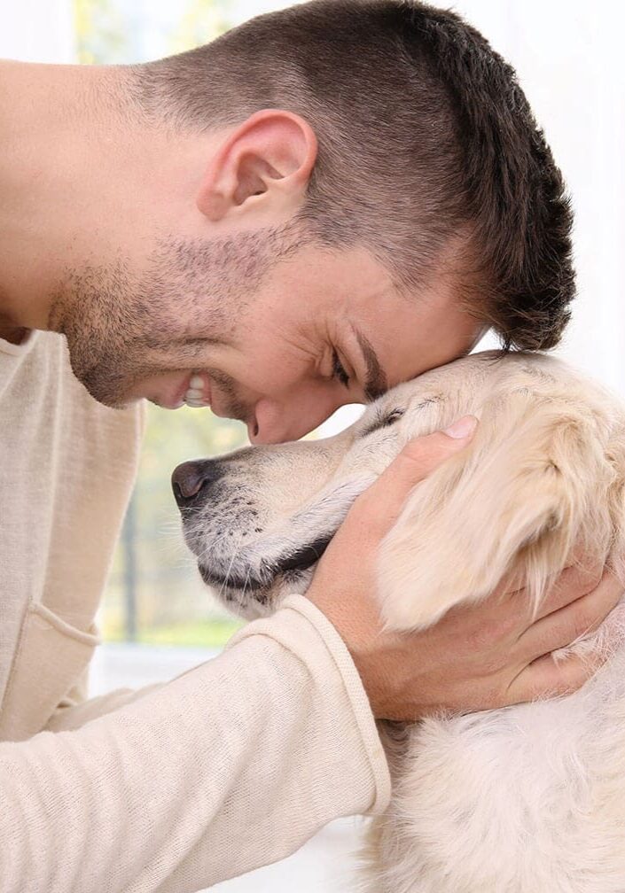 Man Nose To Nose With Dog